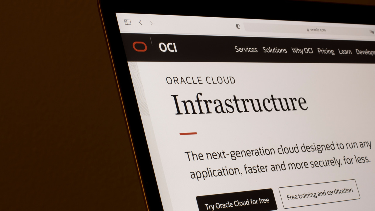 Webpage of the Oracle Cloud Infrastructure (OCI) is seen on the Oracle website on a laptop computer